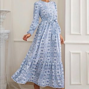 Allover print bishop sleeve ruffle hem belted dress
